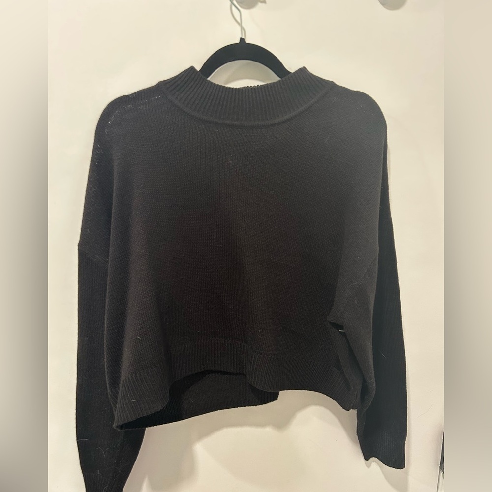 black mock neck sweater
